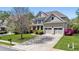 Charming two-story home with a well-maintained lawn, double garage and mature landscaping at 2823 Seagrave Way, Marietta, GA 30066