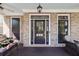 Charming front porch with brick accents and comfortable seating at 2823 Seagrave Way, Marietta, GA 30066