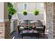 Relaxing front porch featuring a cozy seating area with hanging plants at 2823 Seagrave Way, Marietta, GA 30066
