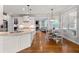 Open-concept kitchen and dining area with modern island and seamless transition to the living space at 2823 Seagrave Way, Marietta, GA 30066