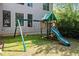 Wooden play set with swings and a slide, nestled in a grassy backyard at 2823 Seagrave Way, Marietta, GA 30066