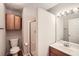Bright bathroom features a shower, vanity with sink, and a medicine cabinet at 2010 Univeter Rd, Canton, GA 30115