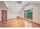 Spacious bedroom with hardwood floors and natural light from a large window at 2010 Univeter Rd, Canton, GA 30115