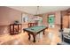 Game room with pool table, ample seating, and natural light at 2010 Univeter Rd, Canton, GA 30115