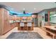 Well-equipped kitchen with wood cabinets, stainless steel appliances, and adjacent breakfast nook at 2010 Univeter Rd, Canton, GA 30115