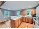 Kitchen featuring wooden cabinets and a breakfast bar at 2010 Univeter Rd, Canton, GA 30115