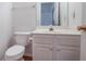 Cozy half bath with a sleek vanity and modern fixtures at 2620 Nesbitt Crossing Way, Duluth, GA 30096