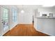 Bright breakfast area with hardwood floors, next to the kitchen, and access to outdoor area at 2620 Nesbitt Crossing Way, Duluth, GA 30096