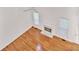 Open-concept living room with a marble fireplace and bright natural light at 2620 Nesbitt Crossing Way, Duluth, GA 30096