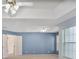 Bright primary bedroom with tray ceilings and neutral carpeting at 2620 Nesbitt Crossing Way, Duluth, GA 30096