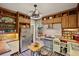 Bright kitchen with custom wood cabinets, stainless steel appliances, and breakfast nook at 452 Cherokee Ne St, Marietta, GA 30060