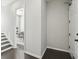 Hallway with wood floors looking into office at 6442 Canopy Dr, Sandy Springs, GA 30328