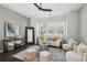 Bright living room with large windows, stylish furniture, and contemporary decor at 6442 Canopy Dr, Sandy Springs, GA 30328