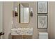 Stylish powder room features a unique marble sink, modern fixtures, and elegant decor at 0 Chattahoochee St, Roswell, GA 30075