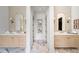 Spacious bathroom with dual vanities, sleek mirrors, and stylish decor at 0 Chattahoochee St, Roswell, GA 30075