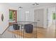 Bright loft area with hardwood floors, built-in shelving, two chairs, and ample natural light at 0 Chattahoochee St, Roswell, GA 30075