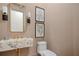 Stylish powder room featuring a unique marble sink and modern fixtures at 0 Chattahoochee St, Roswell, GA 30075