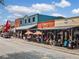 Outdoor dining at Lola's restaurant on a sunny day at 0 Chattahoochee St, Roswell, GA 30075