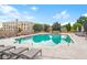 Rooftop swimming pool surrounded by lounge chairs and lush landscaping at 325 E Paces Ferry Ne Rd # 1803, Atlanta, GA 30305