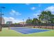 Community tennis court with well-maintained surface and beautiful landscaping at 325 E Paces Ferry Ne Rd # 1803, Atlanta, GA 30305