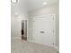 Cozy bedroom with plush carpet featuring a closet and an open doorway to another room at 1434 Fairmont Ave, Atlanta, GA 30318