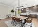 Dining area open to the gourmet kitchen, features stylish decor and modern lighting at 1434 Fairmont Ave, Atlanta, GA 30318