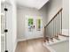 Welcoming entryway with hardwood floors and staircase at 1434 Fairmont Ave, Atlanta, GA 30318