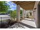 Spacious front porch featuring brick columns, lighting, and a covered entrance at 1434 Fairmont Ave, Atlanta, GA 30318