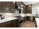 Gourmet kitchen with a stainless steel range, sleek countertops, and ample cabinet space at 1434 Fairmont Ave, Atlanta, GA 30318
