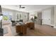 Bright, open-concept living room with fireplace, hardwood floors, and access to the outdoors at 1434 Fairmont Ave, Atlanta, GA 30318