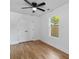 Bedroom featuring hardwood flooring, ceiling fan and double door closet at 1045 Ridgecrest Se Dr, Smyrna, GA 30080