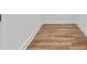 Walk-in closet featuring hardwood flooring and white trim at 1045 Ridgecrest Se Dr, Smyrna, GA 30080