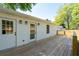 Wooden deck adjacent to the home, perfect for outdoor entertaining and relaxation at 1045 Ridgecrest Se Dr, Smyrna, GA 30080