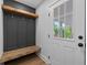 Mudroom with storage space and coat hooks, providing practical organization at 1045 Ridgecrest Se Dr, Smyrna, GA 30080