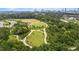 A scenic aerial view of Westside Park with walking paths and lush greenery against the Atlanta skyline at 1436 Fairmont Nw Ave, Atlanta, GA 30318