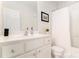 Fresh bathroom featuring a white vanity, clean lines, and a combination tub and shower with modern fixtures at 1976 Cobblestone Ne Cir, Atlanta, GA 30319