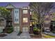 Charming brick townhome with a two-car garage and lovely landscaping at 1976 Cobblestone Ne Cir, Atlanta, GA 30319
