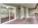 Outdoor balcony featuring sliding glass doors and a wood floor at 2901 Ne Lenox Rd # 305, Atlanta, GA 30324