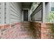 Charming front porch showcasing brick steps and classic architectural details at 2901 Ne Lenox Rd # 305, Atlanta, GA 30324