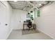 Bright basement office with natural light, perfect for remote work or study, with ample space and a modern desk setup at 2029 Dover Hill Ne Pl, Atlanta, GA 30345