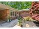 Inviting brick facade with a stylish front door, decorative plants, and a well-maintained walkway at 2029 Dover Hill Ne Pl, Atlanta, GA 30345