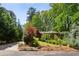 Beautiful brick home with mature landscaping and a lush, green yard in a serene setting at 2029 Dover Hill Ne Pl, Atlanta, GA 30345