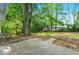 Lush backyard with mature trees and private setting at 2254 Lisbon Ln, Jonesboro, GA 30236