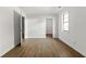 Bright bedroom with new hardwood floors and a window to let in natural light at 2254 Lisbon Ln, Jonesboro, GA 30236