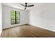 Empty bedroom featuring large window and great view at 2254 Lisbon Ln, Jonesboro, GA 30236