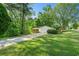 Charming home with a brick facade, white garage, and lush green lawn at 2254 Lisbon Ln, Jonesboro, GA 30236