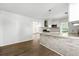 Open-concept kitchen featuring granite countertops and stainless steel appliances at 2254 Lisbon Ln, Jonesboro, GA 30236