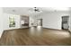 Open-concept living room with a fireplace and views of the backyard at 2254 Lisbon Ln, Jonesboro, GA 30236