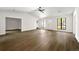 Bright and airy living room featuring hardwood floors and large windows at 2254 Lisbon Ln, Jonesboro, GA 30236
