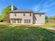 Home's backyard features a well-manicured lawn, private fence, and large back windows to let light in at 4269 David Austin Ct, Snellville, GA 30039